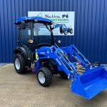 Front view of new Solis 26HST (Hydrostatic) Compact Tractor with Cab, Loader & 4:1 Bucket with loader lowered