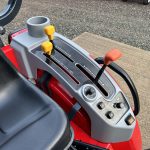 Close up of control levers on the Massey Ferguson 1740M 4WD Compact Tractor