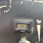 Close up of hour clock of Toro Mid-Size 36" Pedestrian Commercial Flail Mower