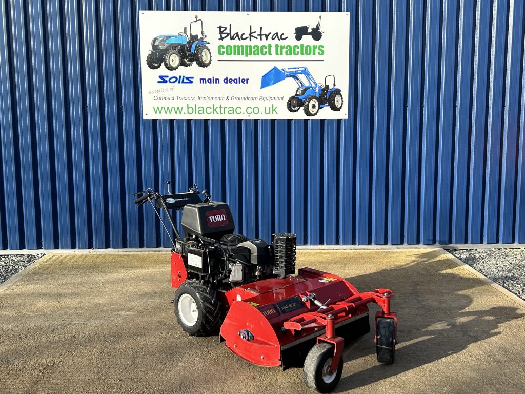 Front / side view of Toro Mid-Size 36" Pedestrian Commercial Flail Mower
