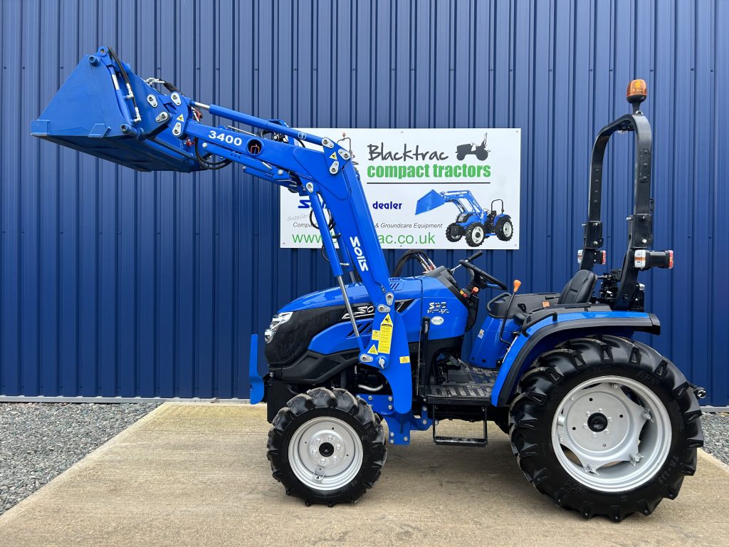 Side view of new Solis 40 Shuttle 4WD Compact Tractor with Front Loader raised